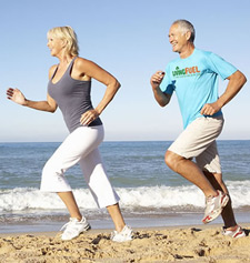seniors running on beach